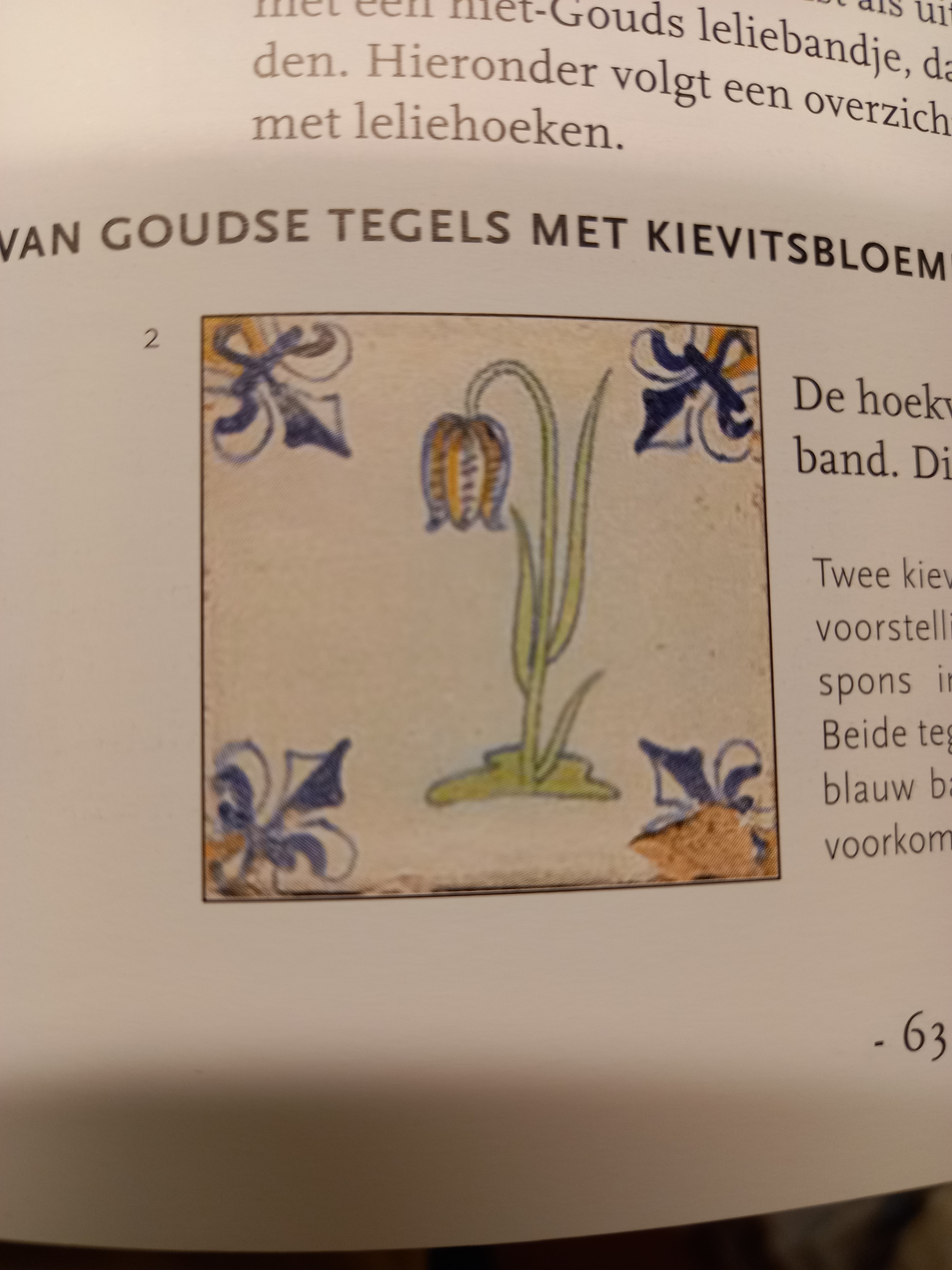 Gouda tile with fritllary, corner motif lily, published by Mayenburg/ denToom