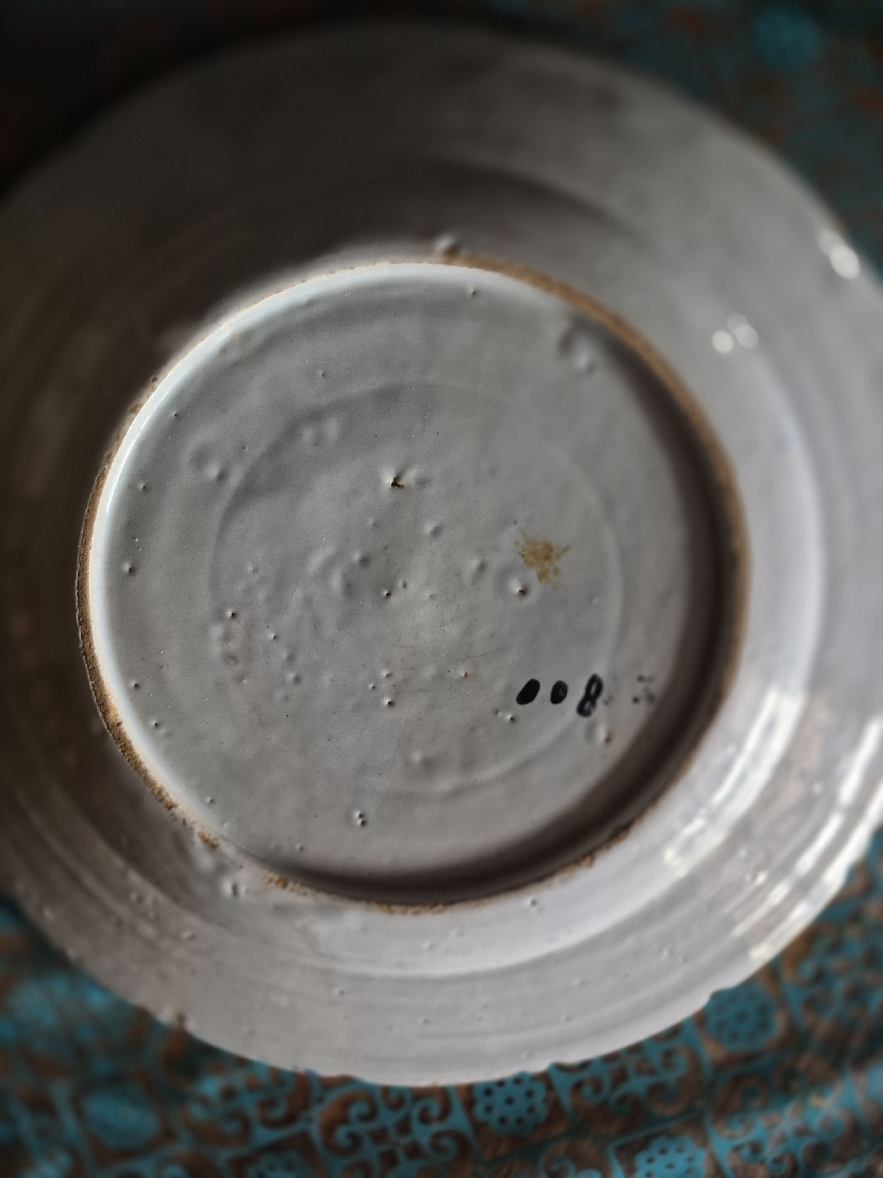 Bijgevoegd de achterkant