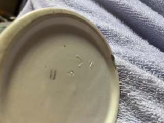 These are the markings underneath one of the vases. 