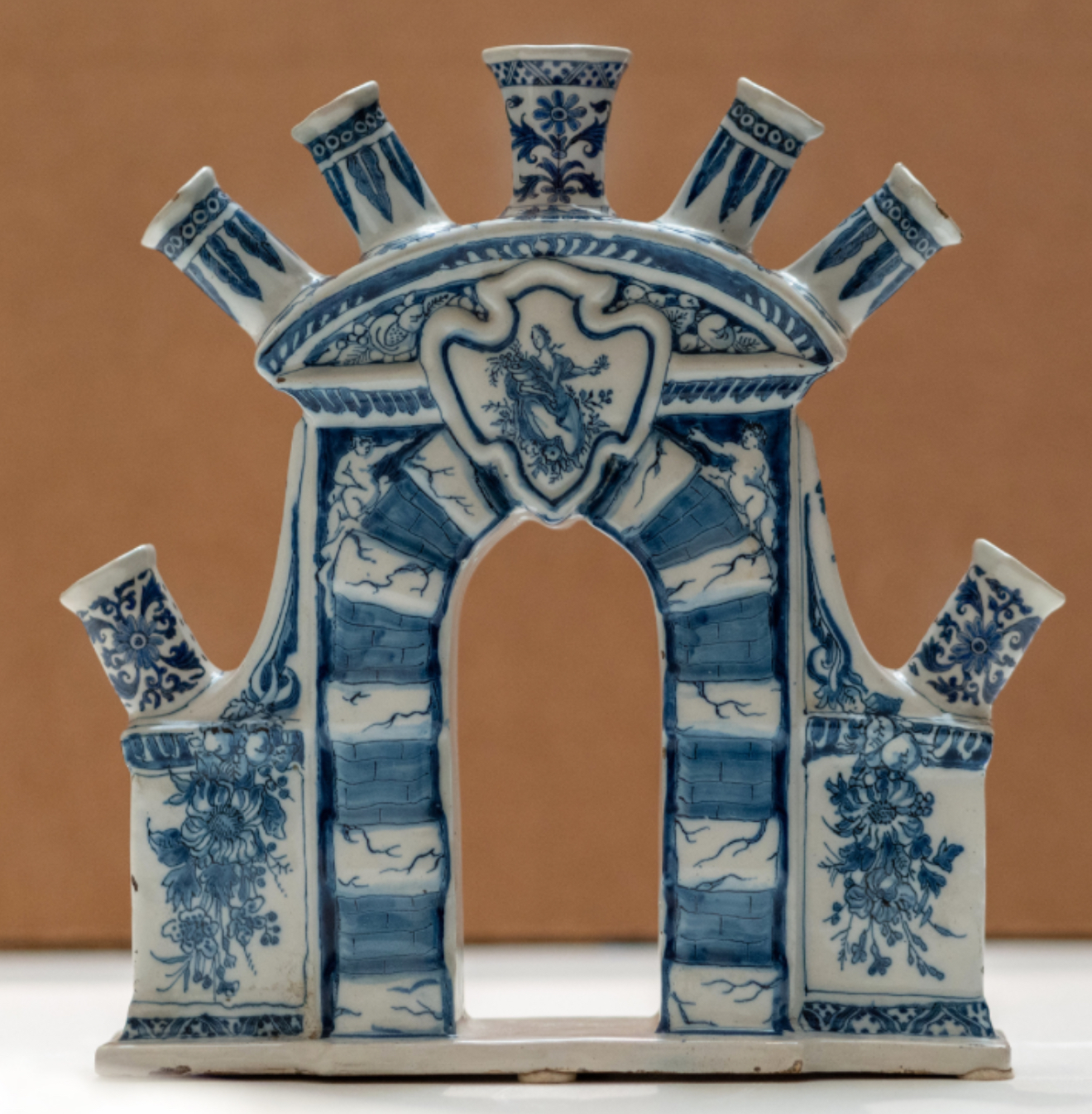 Adriaen Kocx blue and white arched flower vase